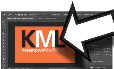 The Koreatown Media Lab Logo in a Photoshop interface with the M selected and a giant cursor hovering over it