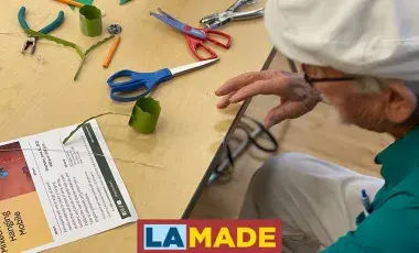 man making a mobile craft