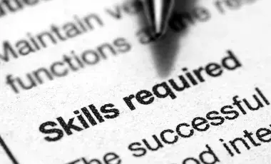 black and white text with a pen tip hovering over the words "Skills Required" in Bold print