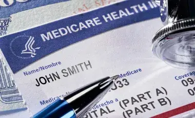 Medicare card with pen