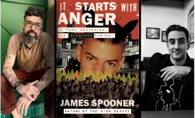 Authors James Spooner and Dan Ozzi seated with the book "It Starts With Anger" between them.