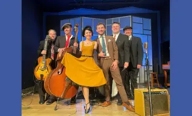 6 members of the Pepper Moons Swing Ensemble pose with their instruments