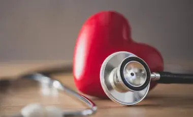 heart next to a stethoscope