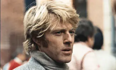 man with grey sweater