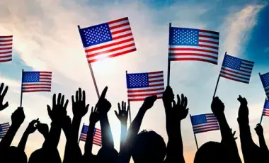 People holding up flag