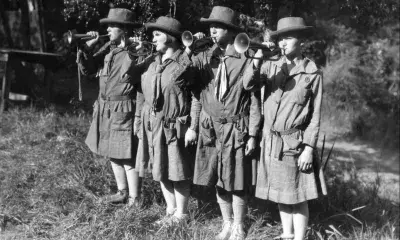 A Troop of Santa Monica-based Girl Scouts are shown playing their bugles, circa 1925.