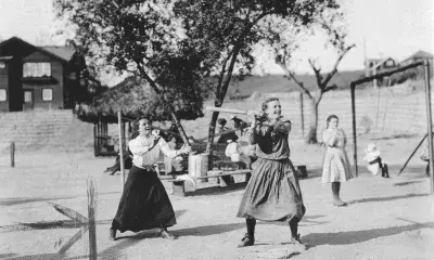 Bloomer girls playing baseball at an Echo Park playground in 1907