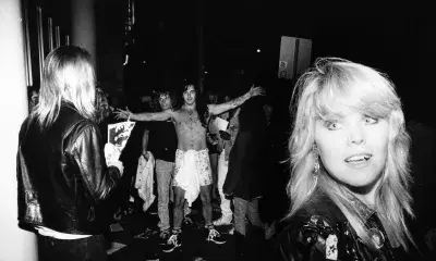 black and white photo of people at concert