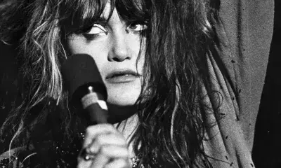 close up of singer holding microphone