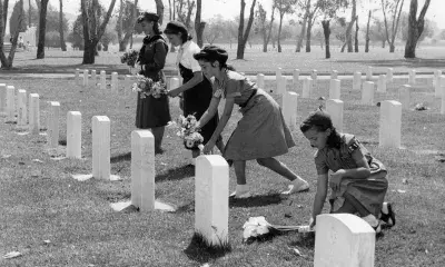 Valley Girl Scouts join in honoring veterans buried at West Los Angeles National Cemetery, 1958.