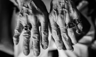Hands of older adult wearing rings