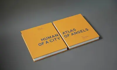 Two books side by side that read "Human Atlas of a City of Angels"