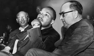 Martin Luther King and Governor Edmund G. Brown during a Freedom Rally at the Los Angeles Sports Arena on June 18, 1961