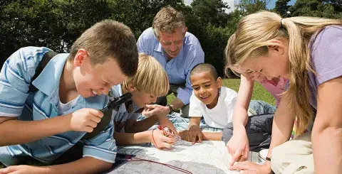 Kids, teens planning a nature exploration in the neighborhood