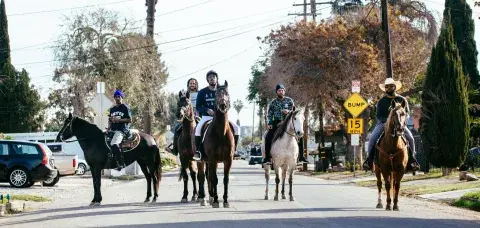 The Compton Cowboys on horseback