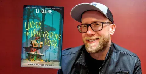 Author TJ Klune and his latest novel, Under the Whispering Door