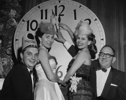 Group Photo in Front of Clock