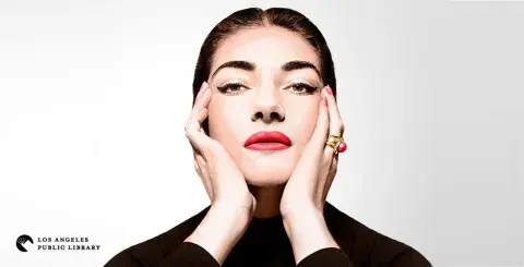a photograph of Maria Callas wearing black looking straight into the camera