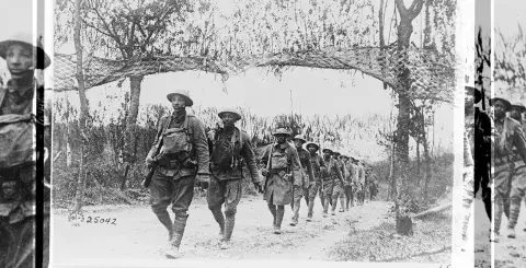 U.S. Army Infantry troops, African American unit, marching northwest of Verdun, France, in World War I