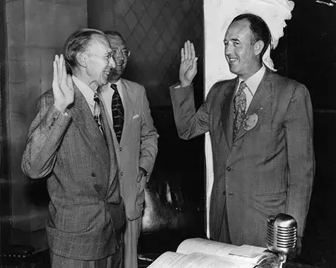 William H. Parker raises his right hand and takes his oath of office administered by City Clerk Walter C. Peterson.