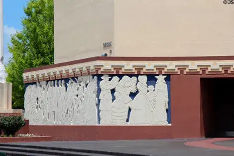 Bas-relief mural on the exterior of a building.