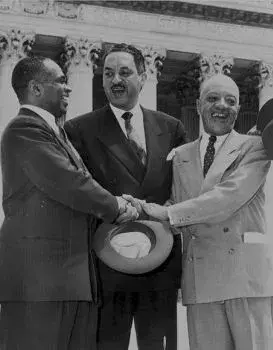 Left to right: George E.C. Hayes, Thurgood Marshall, and James M. Nabrit, congratulating each other, following Supreme Court decision declaring segregation unconstitutional.