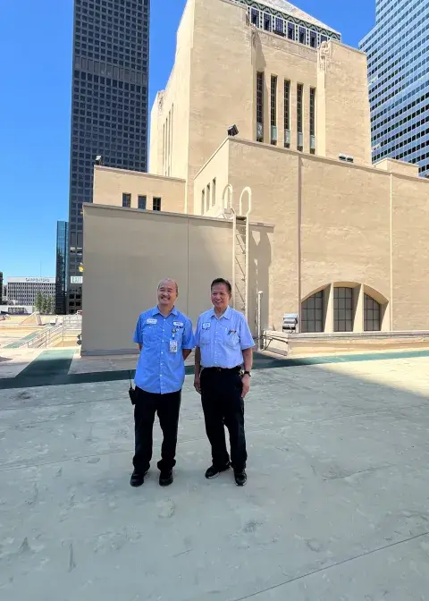 Jesnin Yu and Ernie Olivar on the platform below the central tower