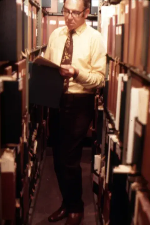 Siegel in the book stacks 