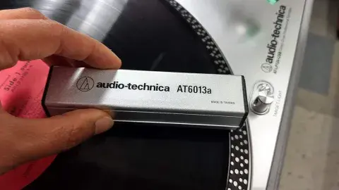 photo demonstrating record cleaning brush