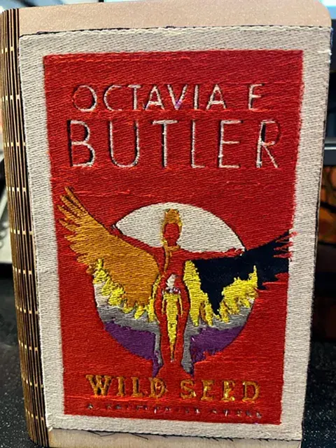 embroidered cover of wild seed