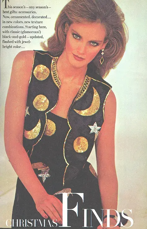 women wearing a vest with gold stars