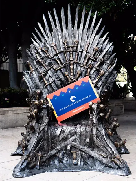 Game of Thrones throne with giant library card