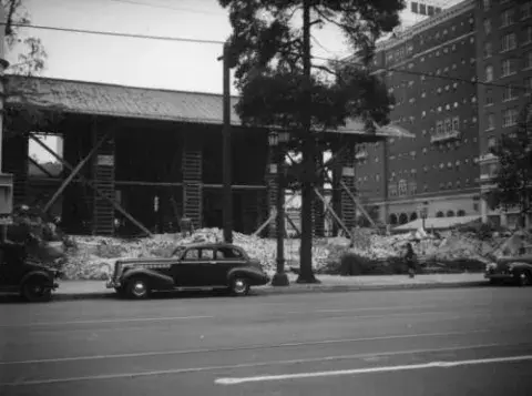 Portion of the (1923) Hollywood Branch Library shored up and ready to move down Ivar Avenue to its new location