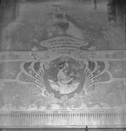 Close-up of the central image on the stage curtain