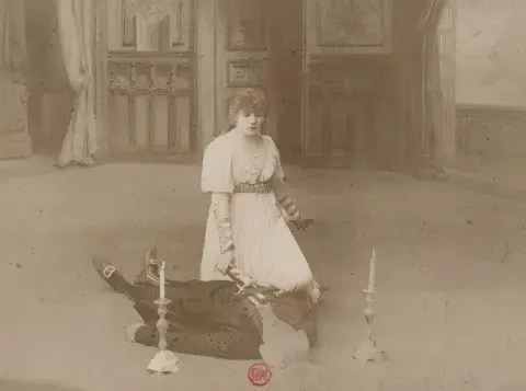 Photos of Sarah in her La Tosca costume during the climax of the play