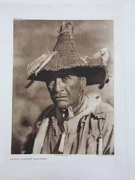 Klamath Warror wearing a traditional Klamath head dress