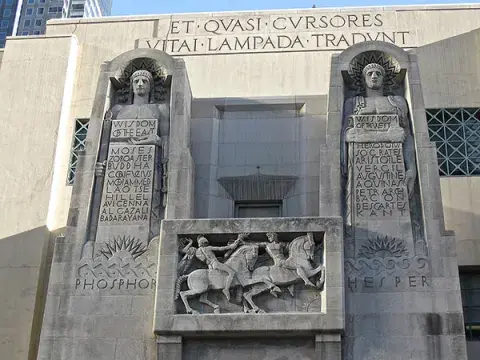 Sculpture on portico of Flower Street facade