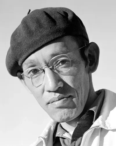portrait of man wearing beret