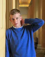 Edouard Louis in a blue sweater
