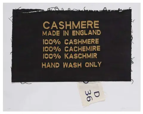 clothing label that reads: CASHMERE Made in England, 100% Cashmere