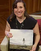 Rachel Sussman holding onto a book
