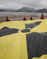 giant parachute with a black and yellow radio-active logo on it