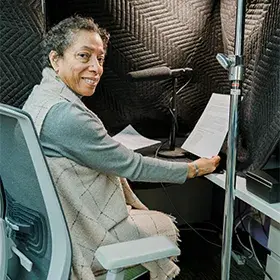 Poet Lynne Thompson recording a podcast episode.