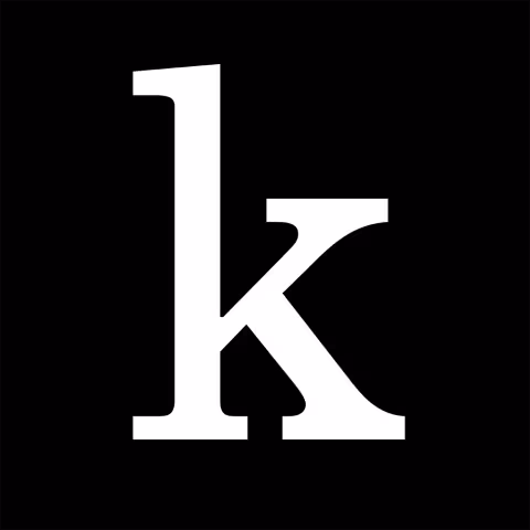 A white letter "k" on a black background