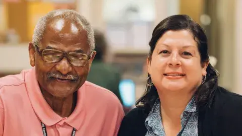Pictured from left: Learner Mark Clemons and Literacy Coordinator Priscilla Rojas-Naiman