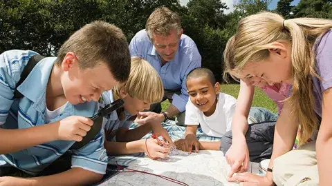 Kids, teens planning a nature exploration in the neighborhood