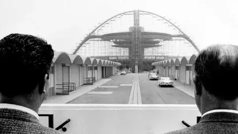 Paul Williams overlooks the construction of the airport restaurant in Los Angeles
