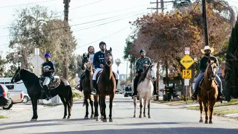 The Compton Cowboys on horseback