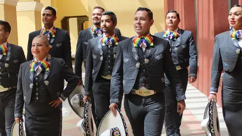 mariachi musicians with rainbow bowties