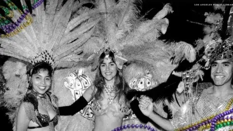 Olvera Street Mardi Gras revelers